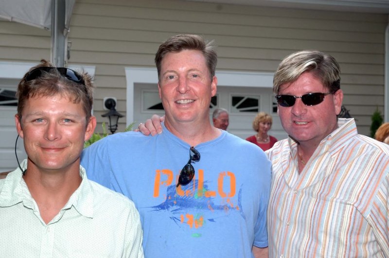 Longtime friends Dave Frederick, Rob Medd and Don Lockwood at a heart transplant party.